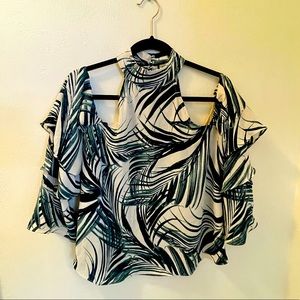 Floral print blouse with long sleeves & exposed shoulders. Size Small.